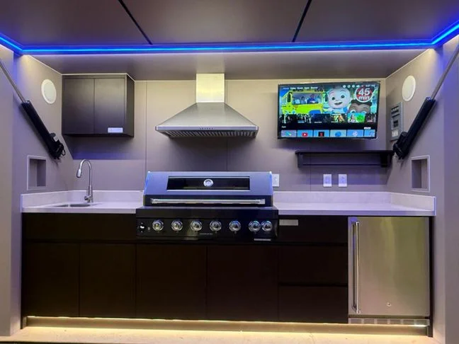 Smart entertainment modular outdoor kitchen with integrated features